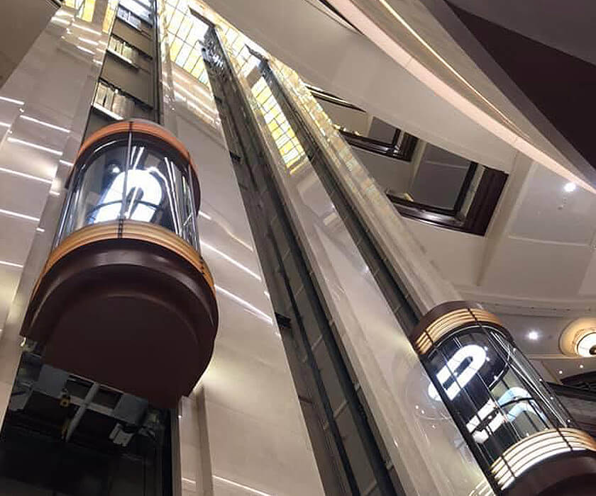 Cost Analysis for Exterior Glass Elevator Systems in Shopping Plaza Developments